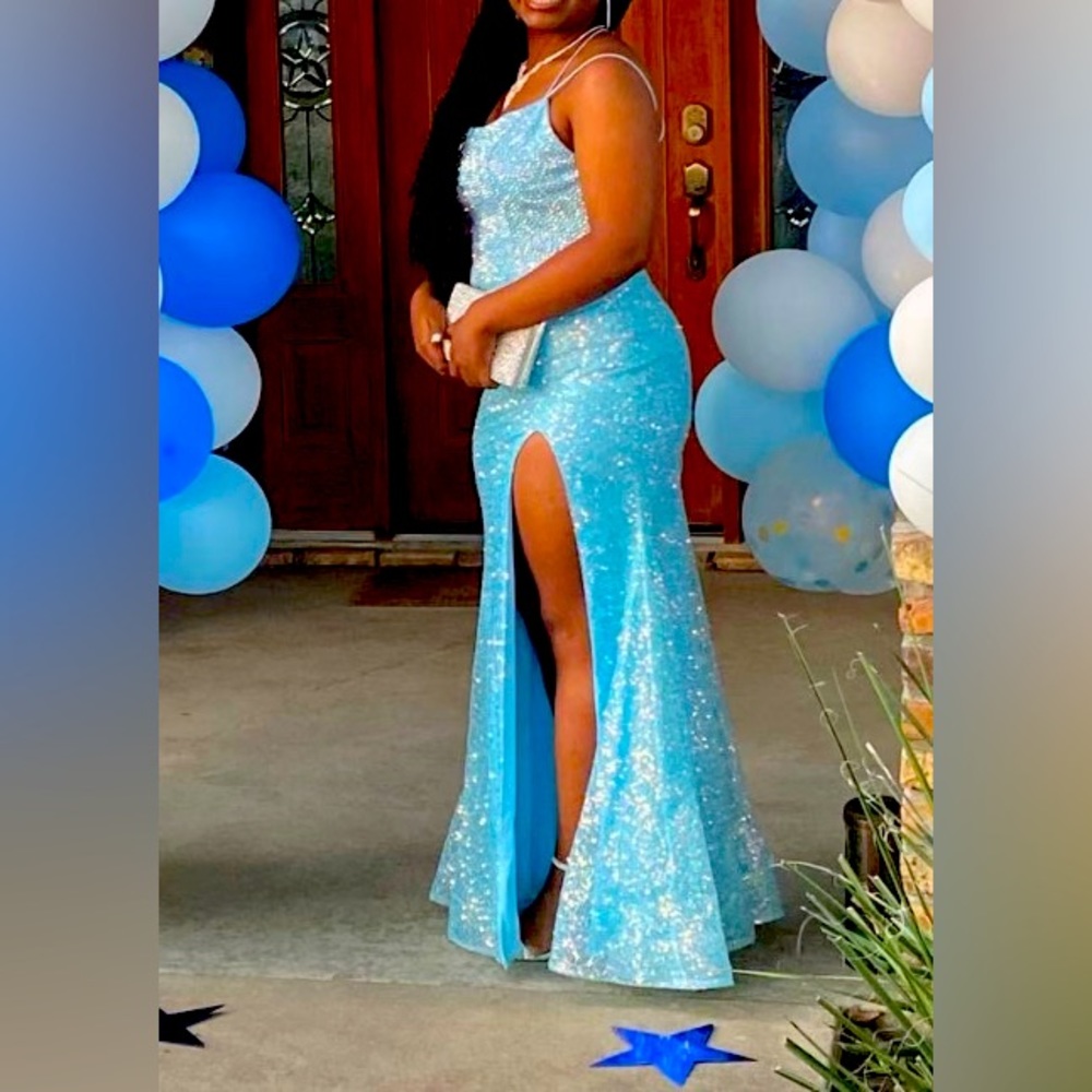 Beautiful light blue prom dress. GLS by Gloria designer size L w crisscross back